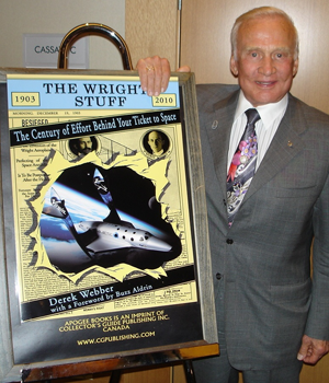 Buzz Aldrin with cover art for book